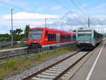 Eriskirch am 24.06.2021 mit 628 486 als RB in Richtung Friedrichshafen und 650 020 als RB in Richtung Lindau